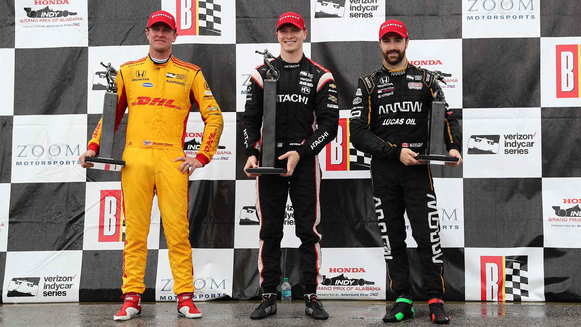 Josef Newgarden, Ryan Hunter-Reay and James Hinchcliffe line up for a podium shoot